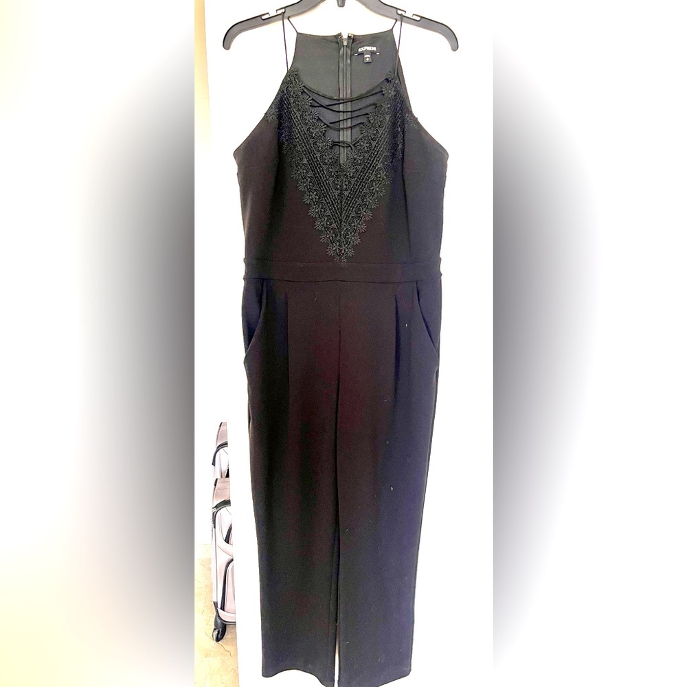 Worn once. Express jumpsuit with lace up detail.
